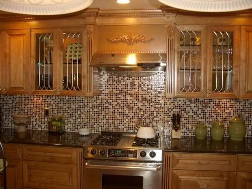 Granite backsplash ideas. orange kitchen with open shelving. green ...